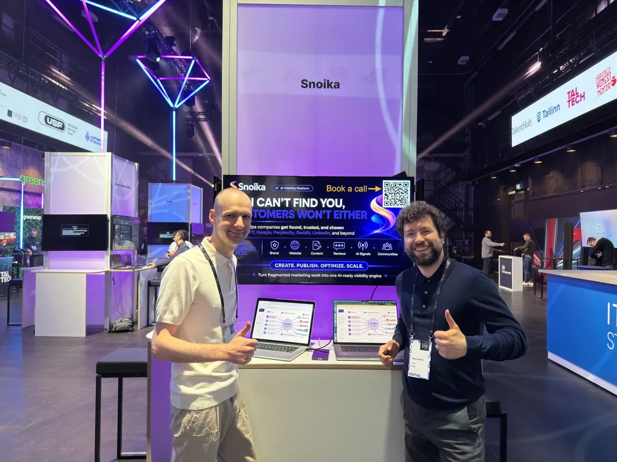 Two Snoika team members at the Snoika stand