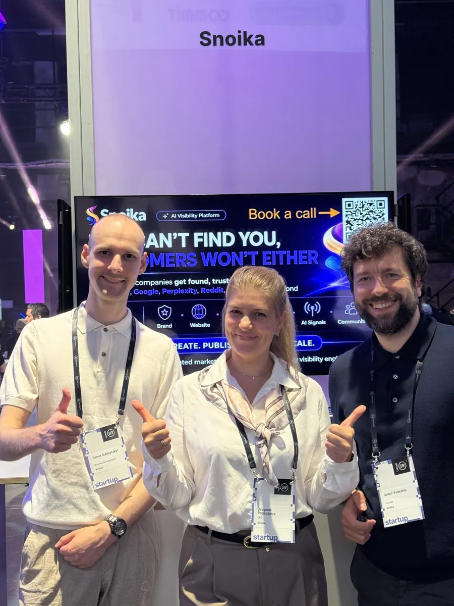 Three people at the Snoika stand